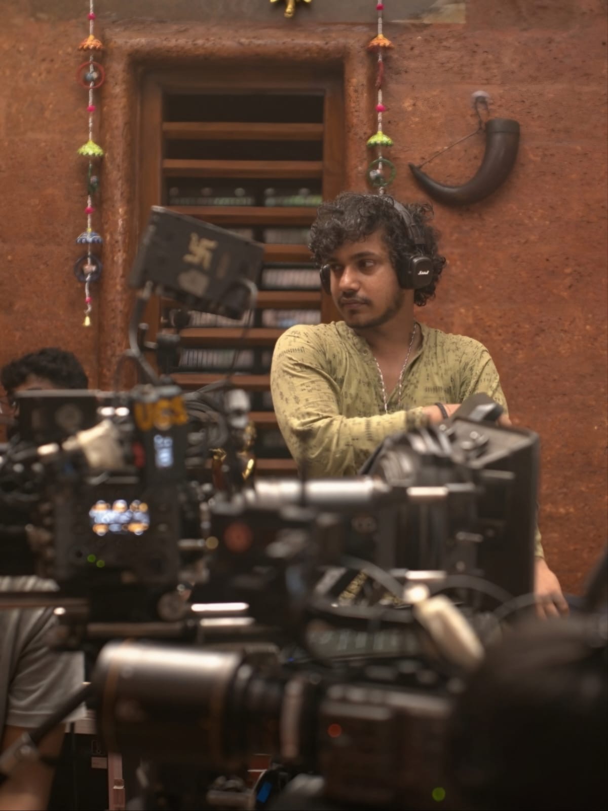 A filmmaker working on a film set